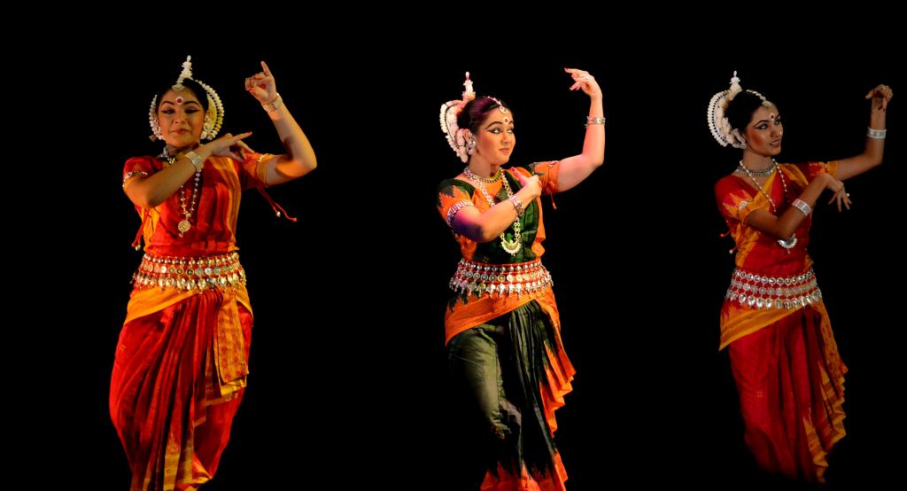 Odissi dancers perform