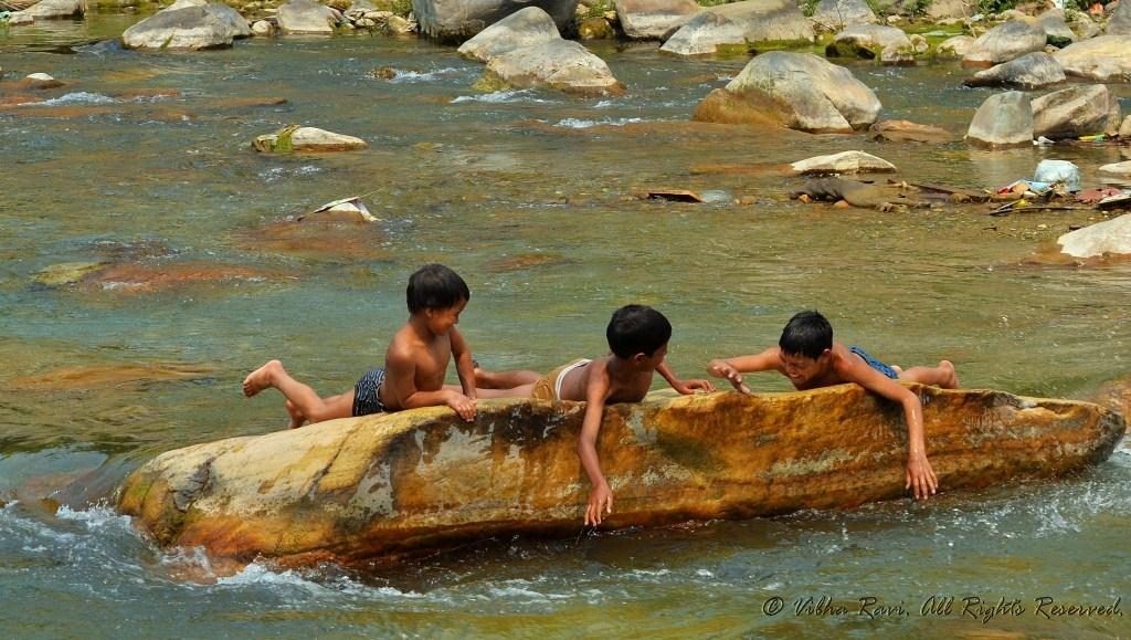 Children play in the Gomti river near Bageshwar