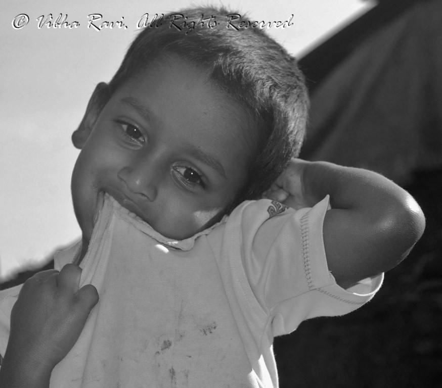 Indian boy feels shy as I take his picture